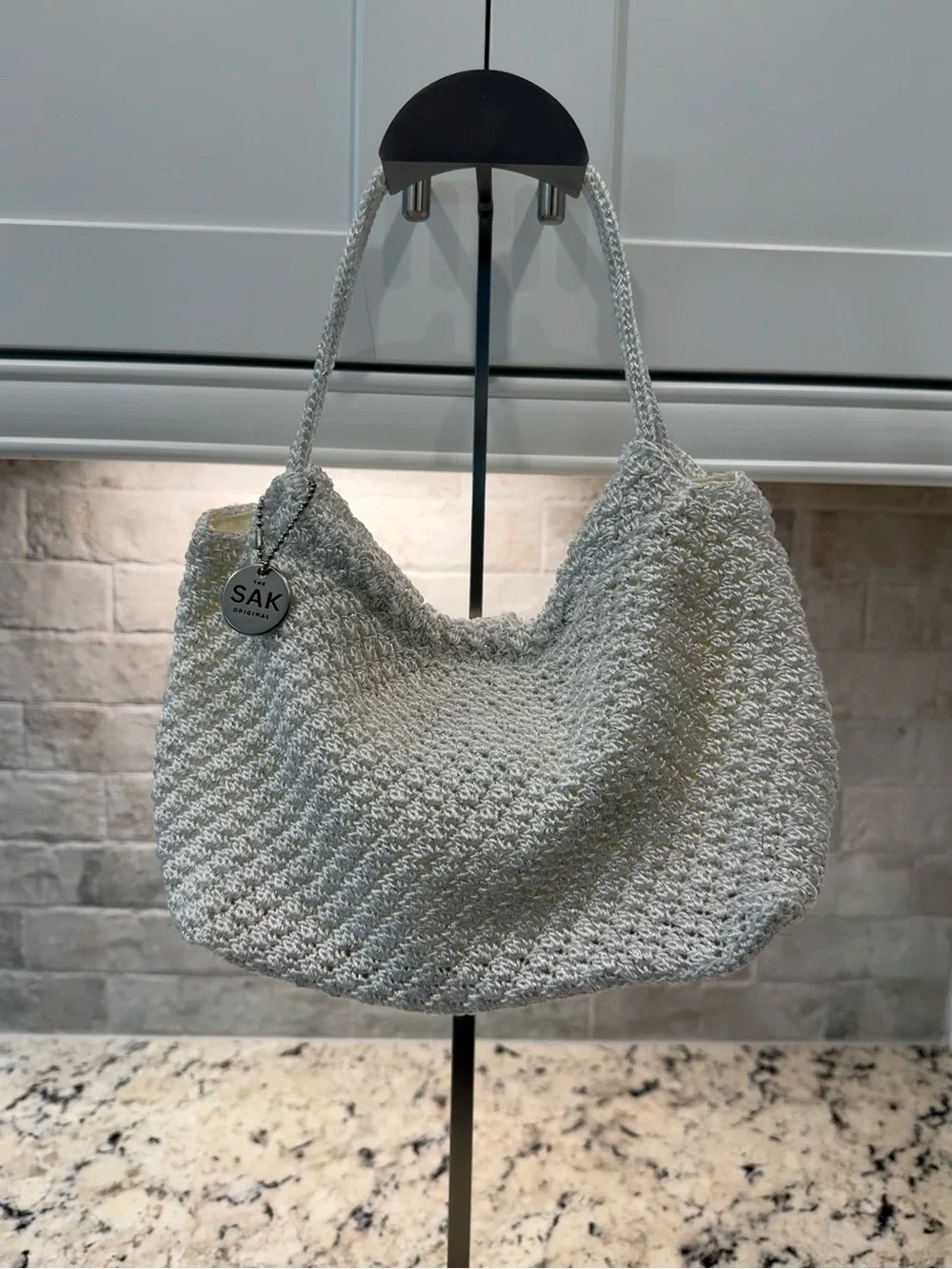 The Sak EUC White & Silver Crochet Hobo Bag
